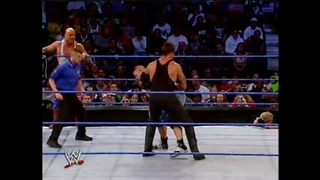 مسابقه تیمی آندرتیکر و کرت انگل مقابل جان سینا و براک لزنر در smackdown 2003 ماه اکتبر 2