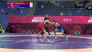 Round 1 FS - 48 kg: E. TURDUBEKOV (KGZ) v. H. ARIAN (IRI)