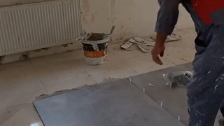 نصب اسلب کف  100*100 به صورت چسبی با همتراز